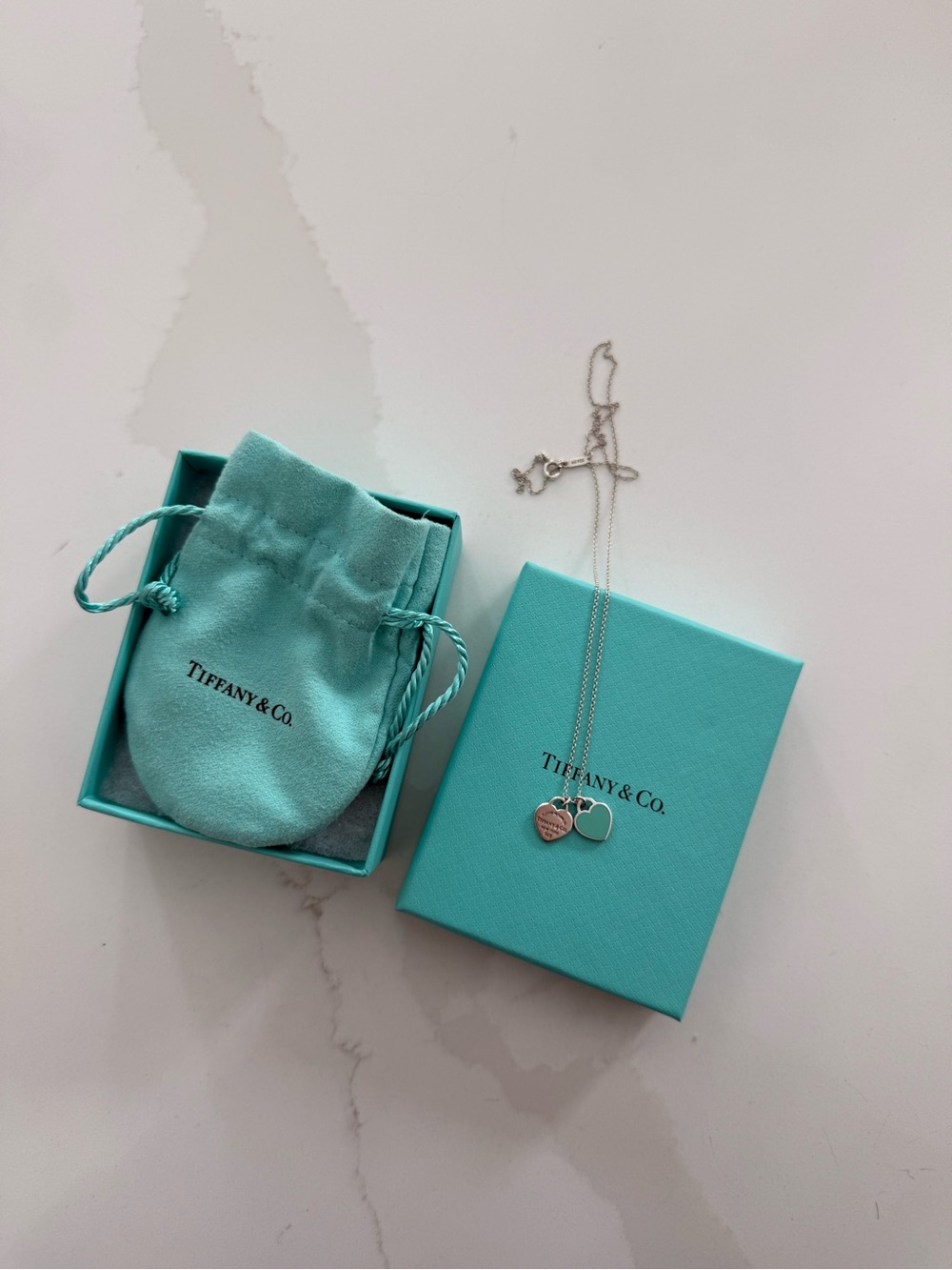 Return to Tiffany™
Tiffany Blue Double Heart Tag Pendant
in Silver, Mini